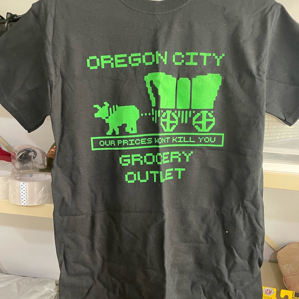 Black T-Shirt with Green Oregon City Grocery Outlet Oregon Trail